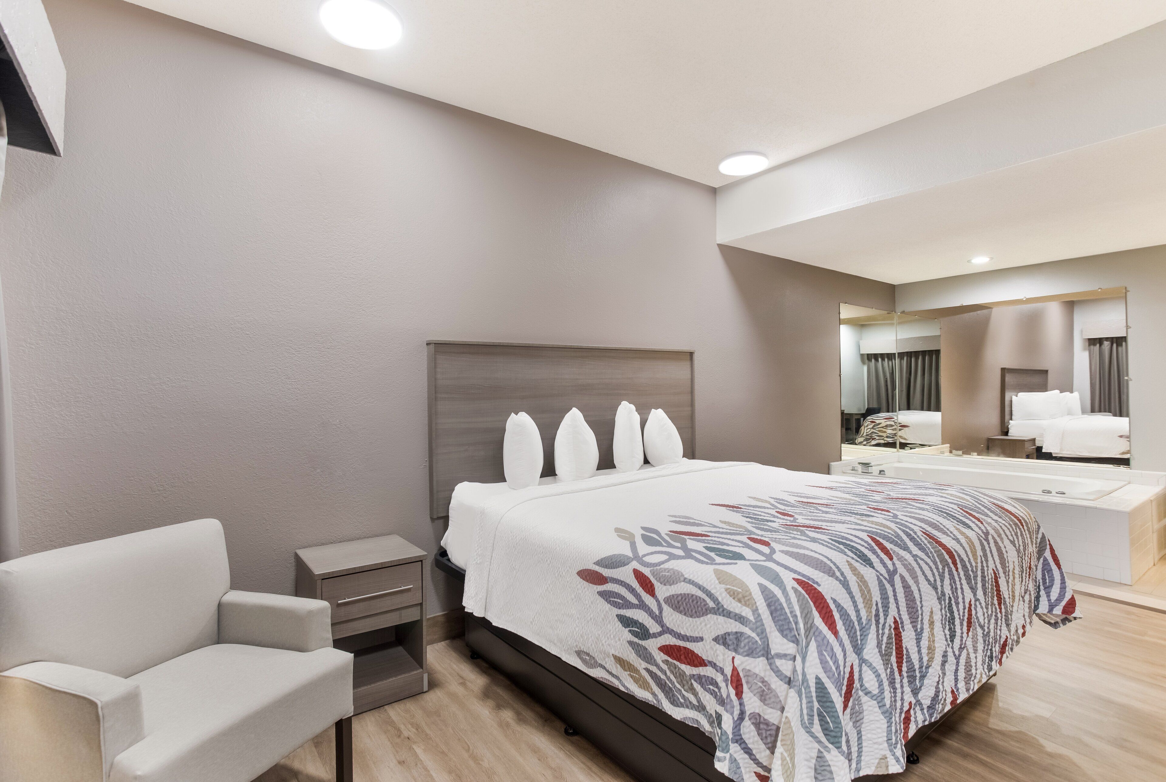 suite, 1 king bed, non smoking, jetted tub | desk, iron/ironing board, free cots/infant beds, rollaway beds