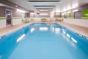 Indoor pool, open 6:00 AM to 10:00 PM, pool loungers