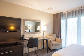 Hypo-allergenic bedding, desk, laptop workspace, blackout curtains