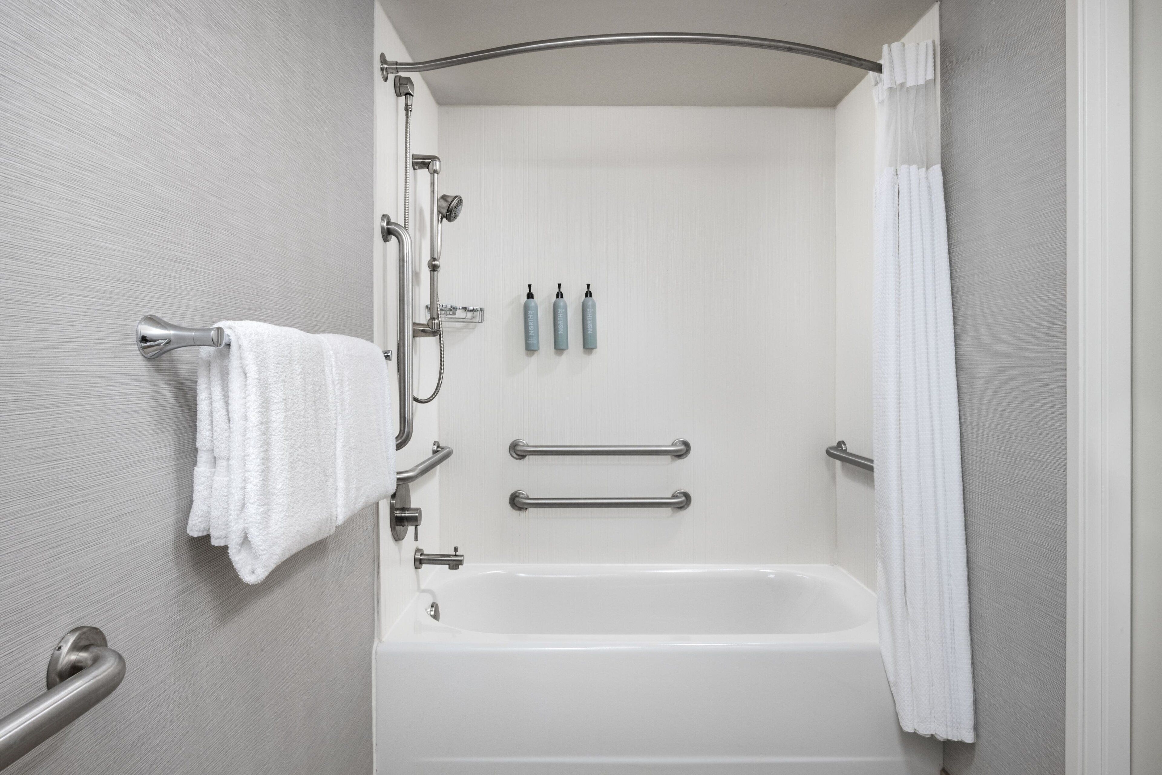 combined shower/bathtub, free toiletries, hair dryer, towels