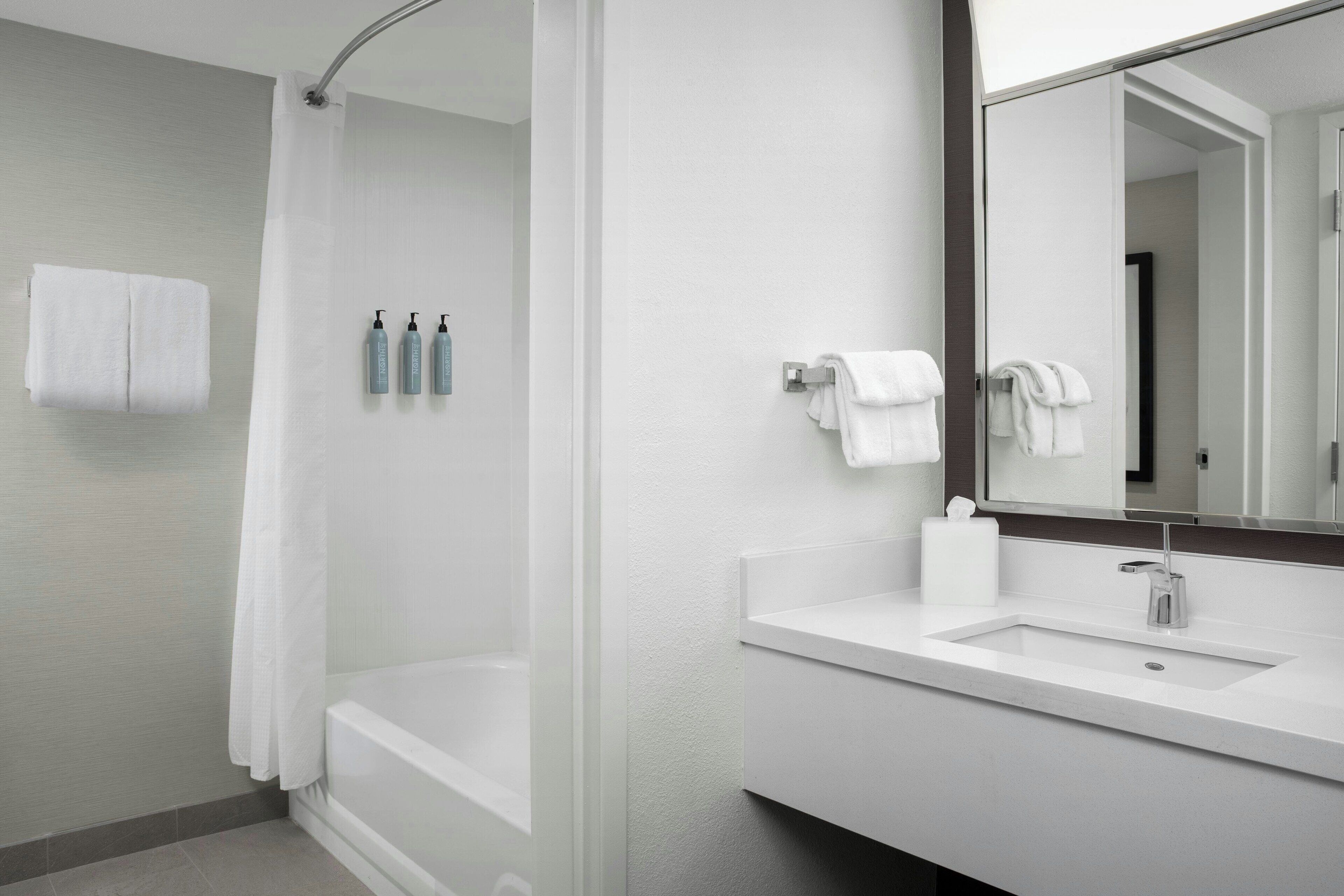 combined shower/bathtub, free toiletries, hair dryer, towels