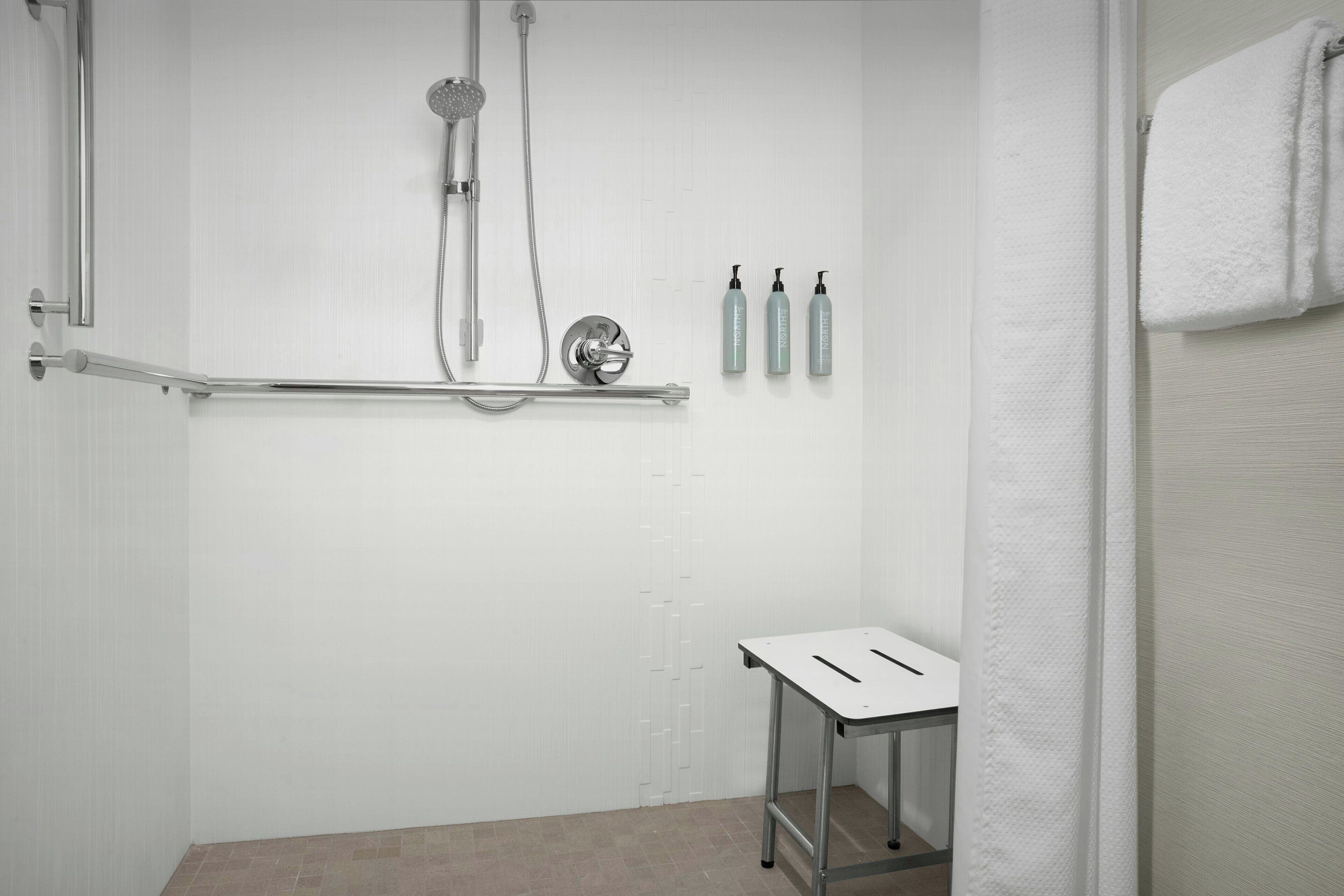 combined shower/bathtub, free toiletries, hair dryer, towels