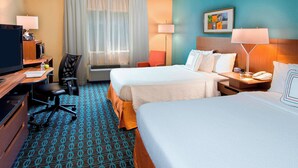 A hotel room with two beds, a desk with a computer, a chair, a TV, and a window with curtains. - Fairfield Inn Tuscaloosa by Marriott (Tuscaloosa)