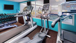 A gym with treadmills, elliptical machines, and dumbbells. - Fairfield Inn Tuscaloosa by Marriott (Tuscaloosa)