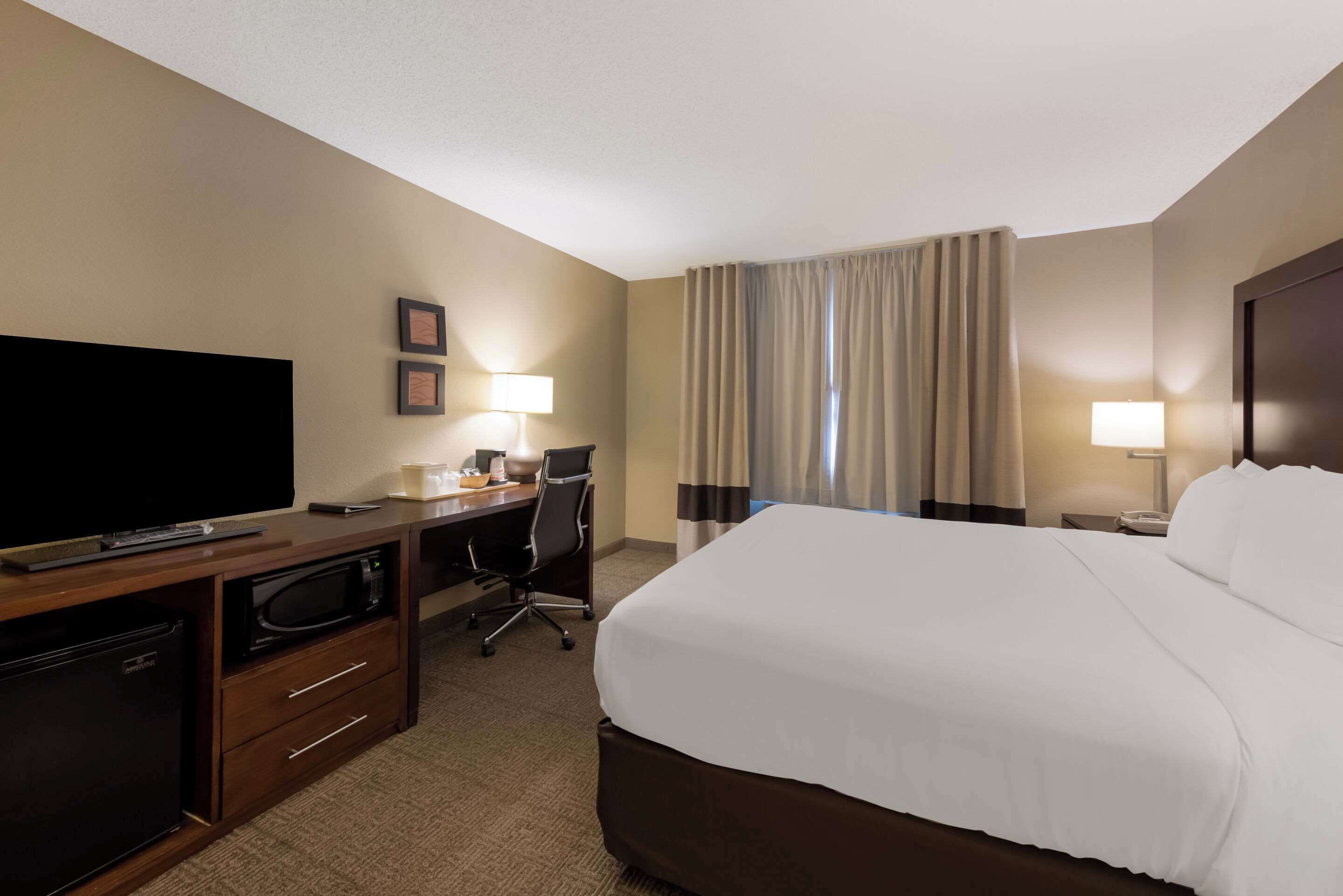 hypo-allergenic bedding, desk, blackout curtains, iron/ironing board