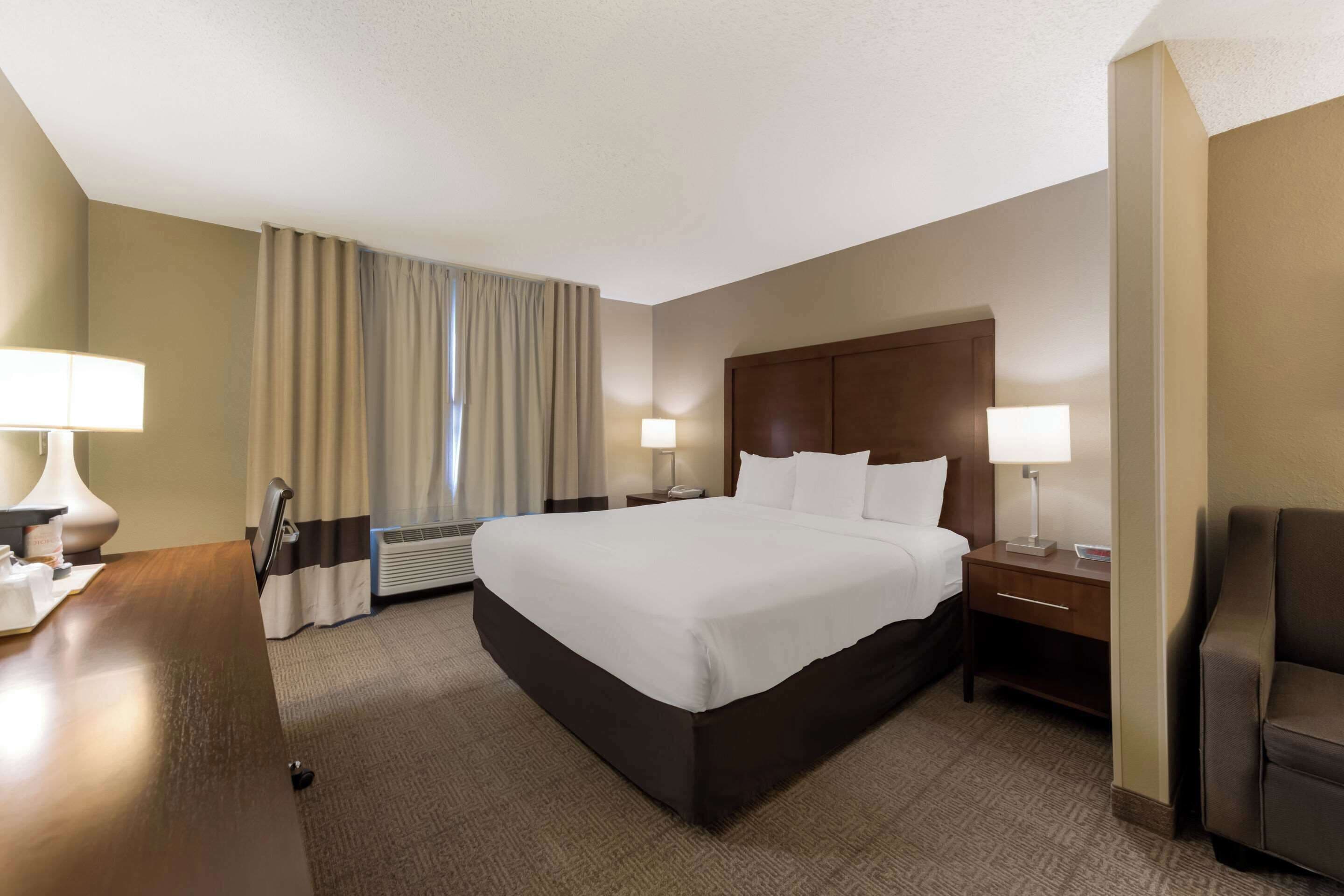 hypo-allergenic bedding, desk, blackout curtains, iron/ironing board