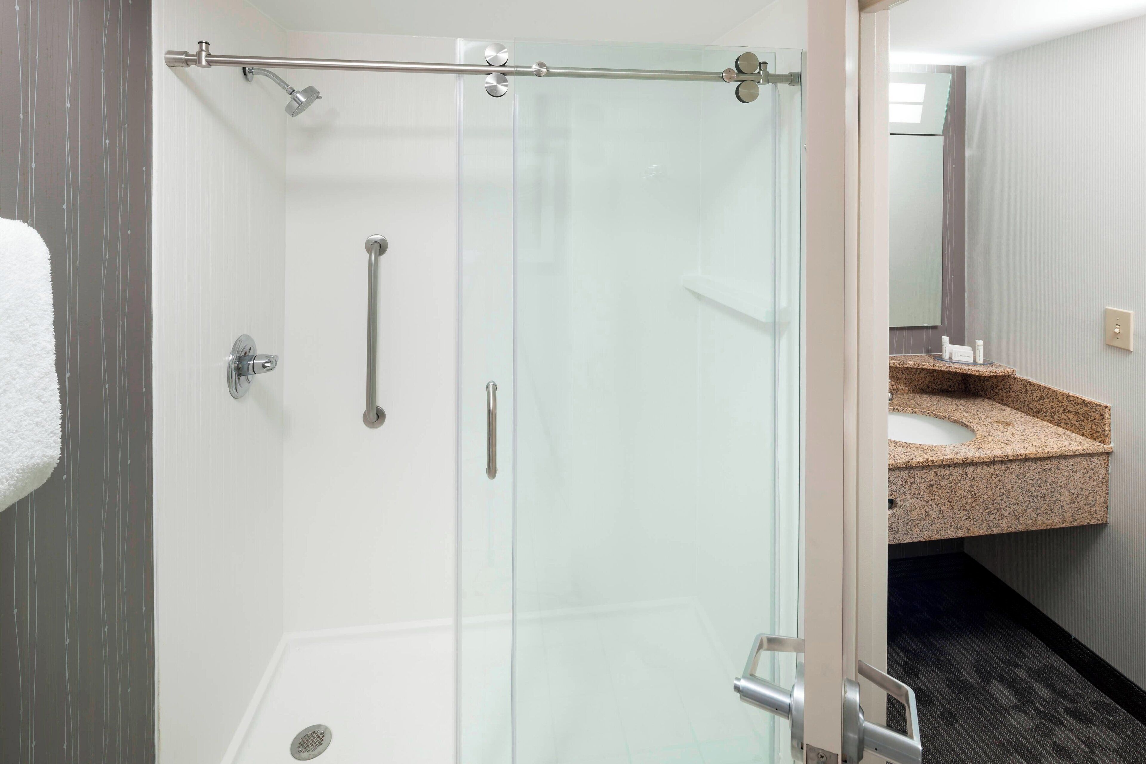 combined shower/bathtub, free toiletries, hair dryer, towels