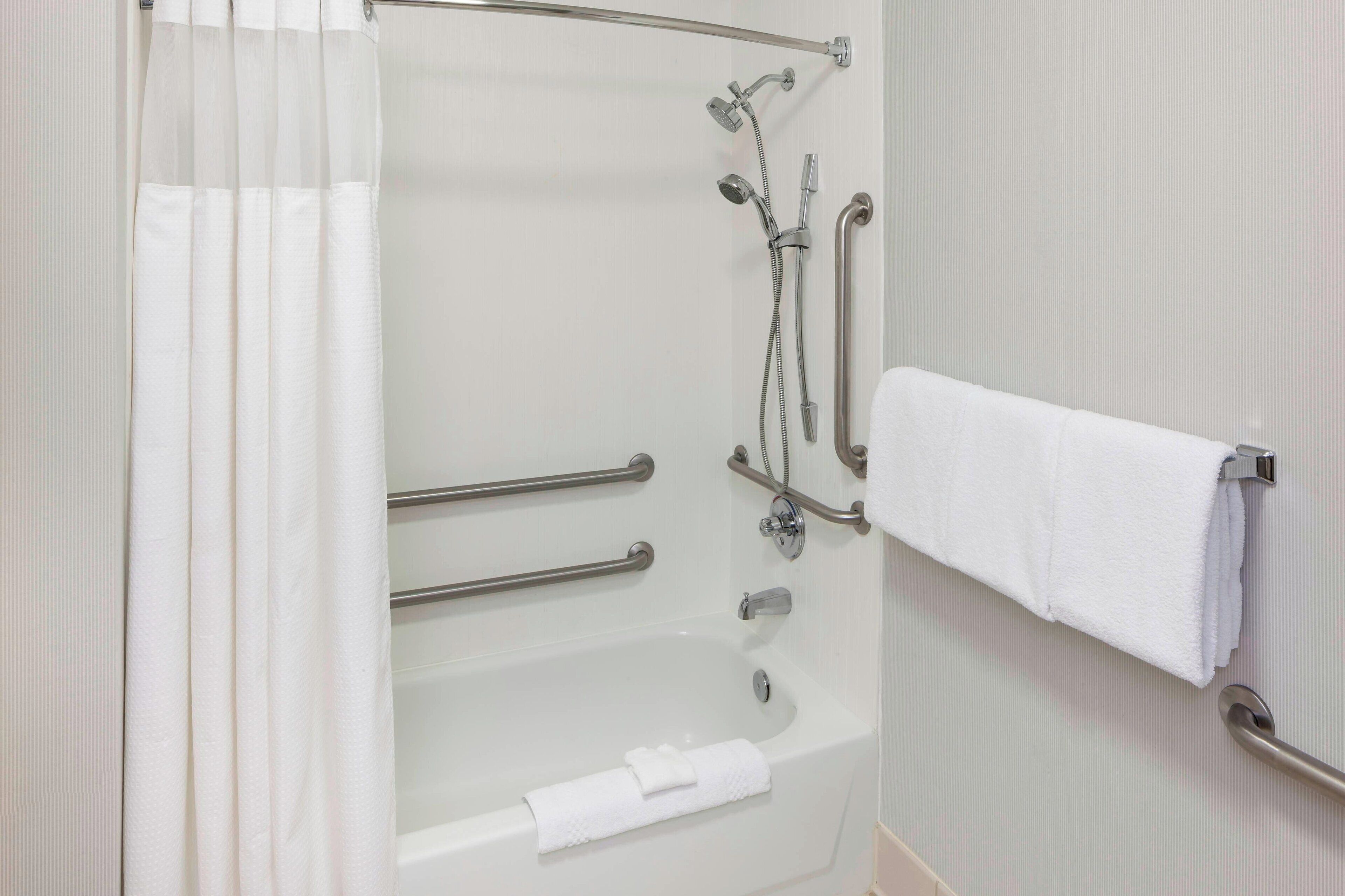 combined shower/bathtub, free toiletries, hair dryer, towels