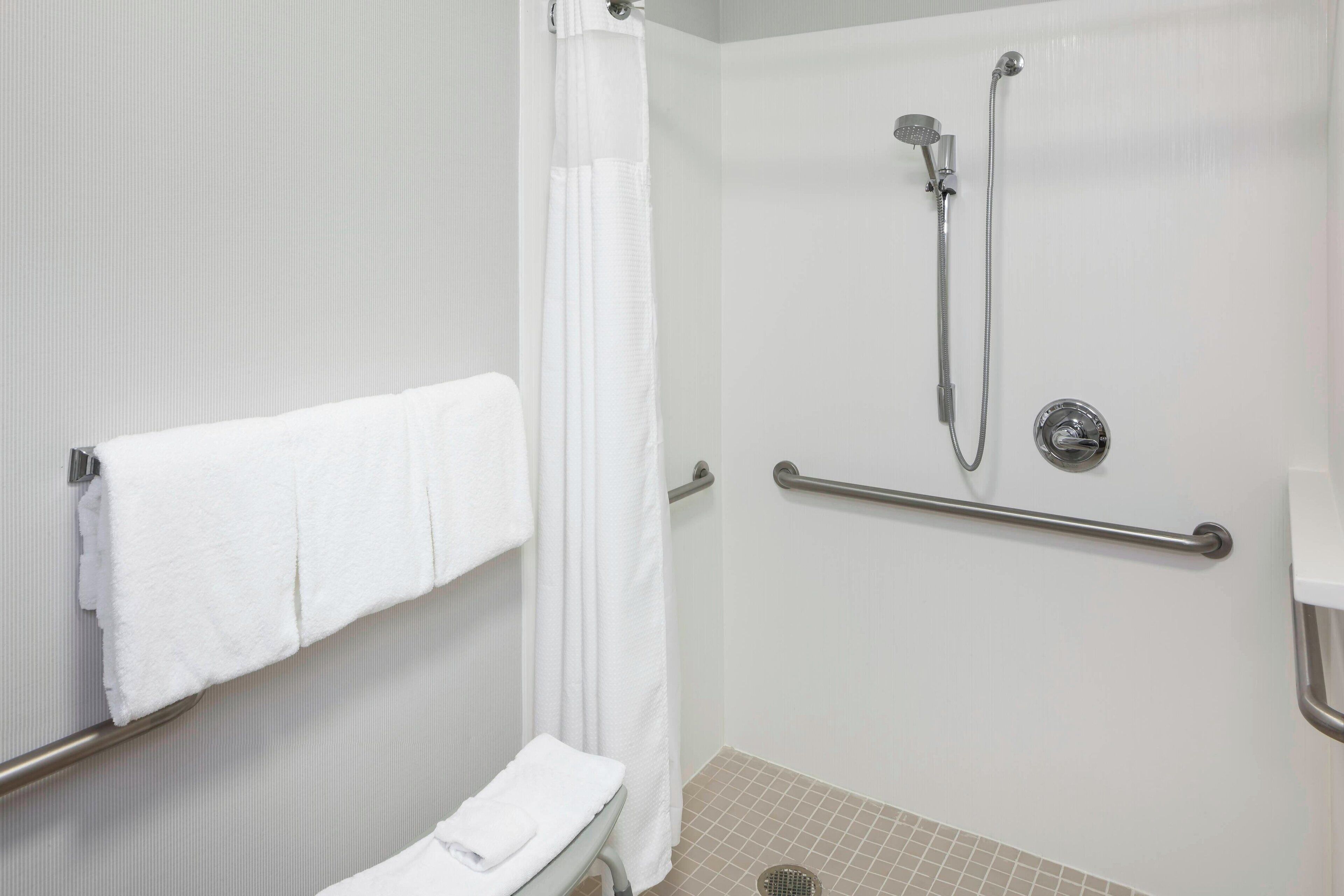combined shower/bathtub, free toiletries, hair dryer, towels