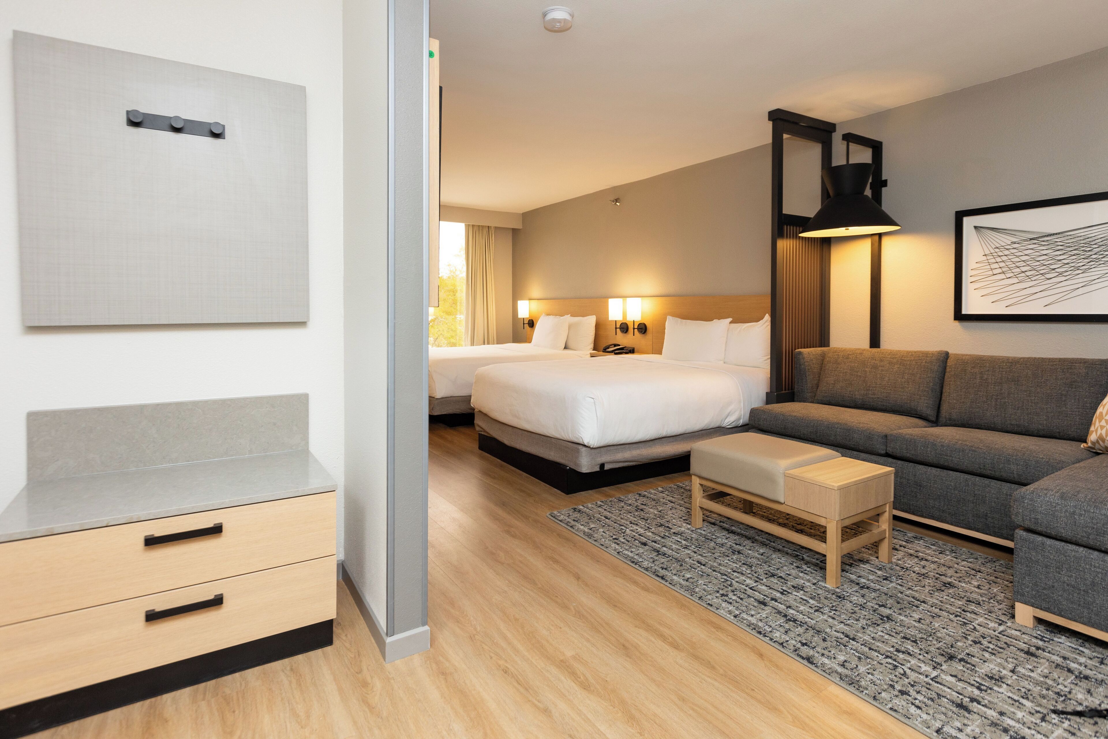 premium bedding, desk, blackout curtains, iron/ironing board