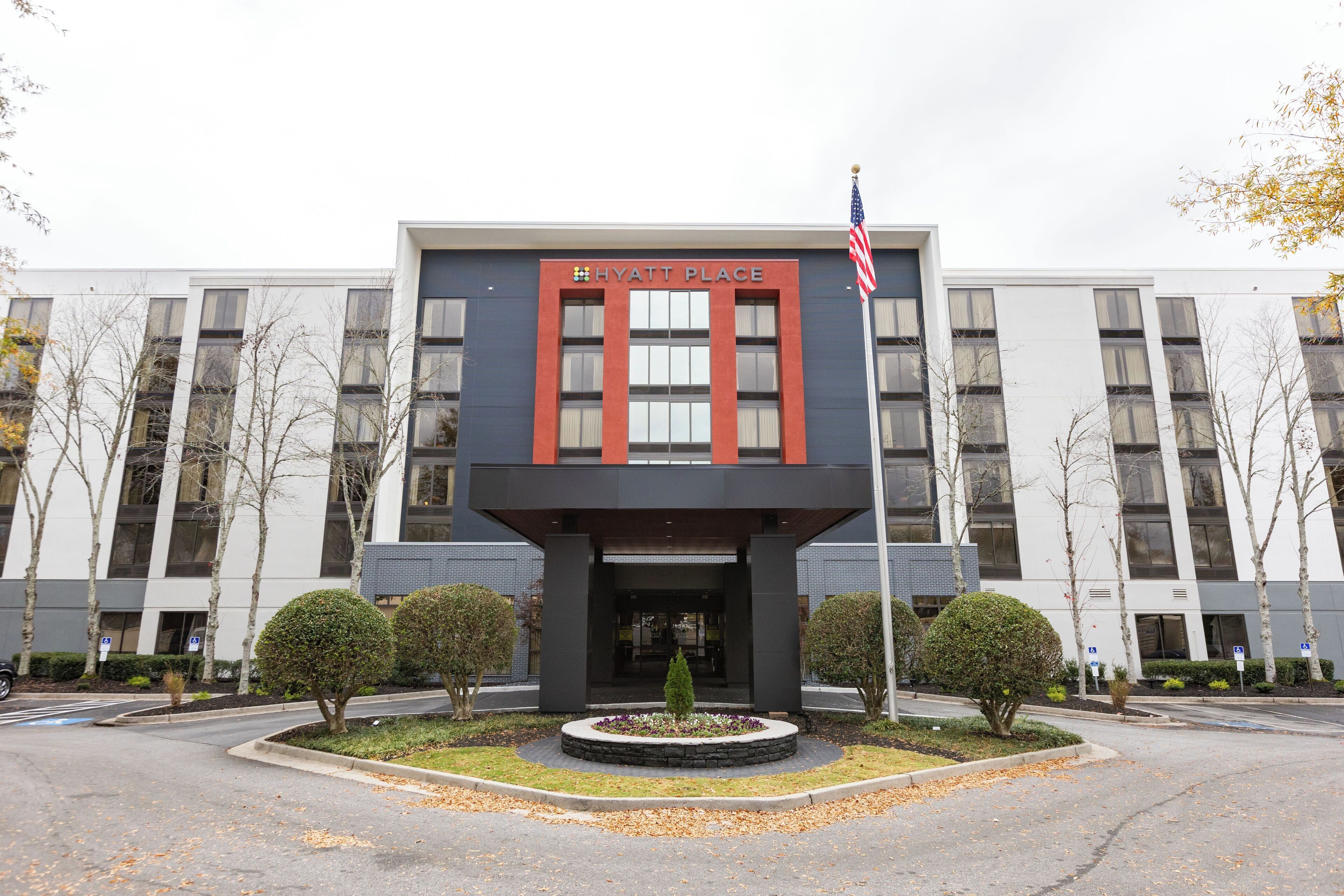 A modern building with a sign reading "Hyatt Place".