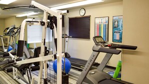 A gym with treadmills, weight machines, and exercise balls. - MainStay Suites Wichita Northeast (Wichita)