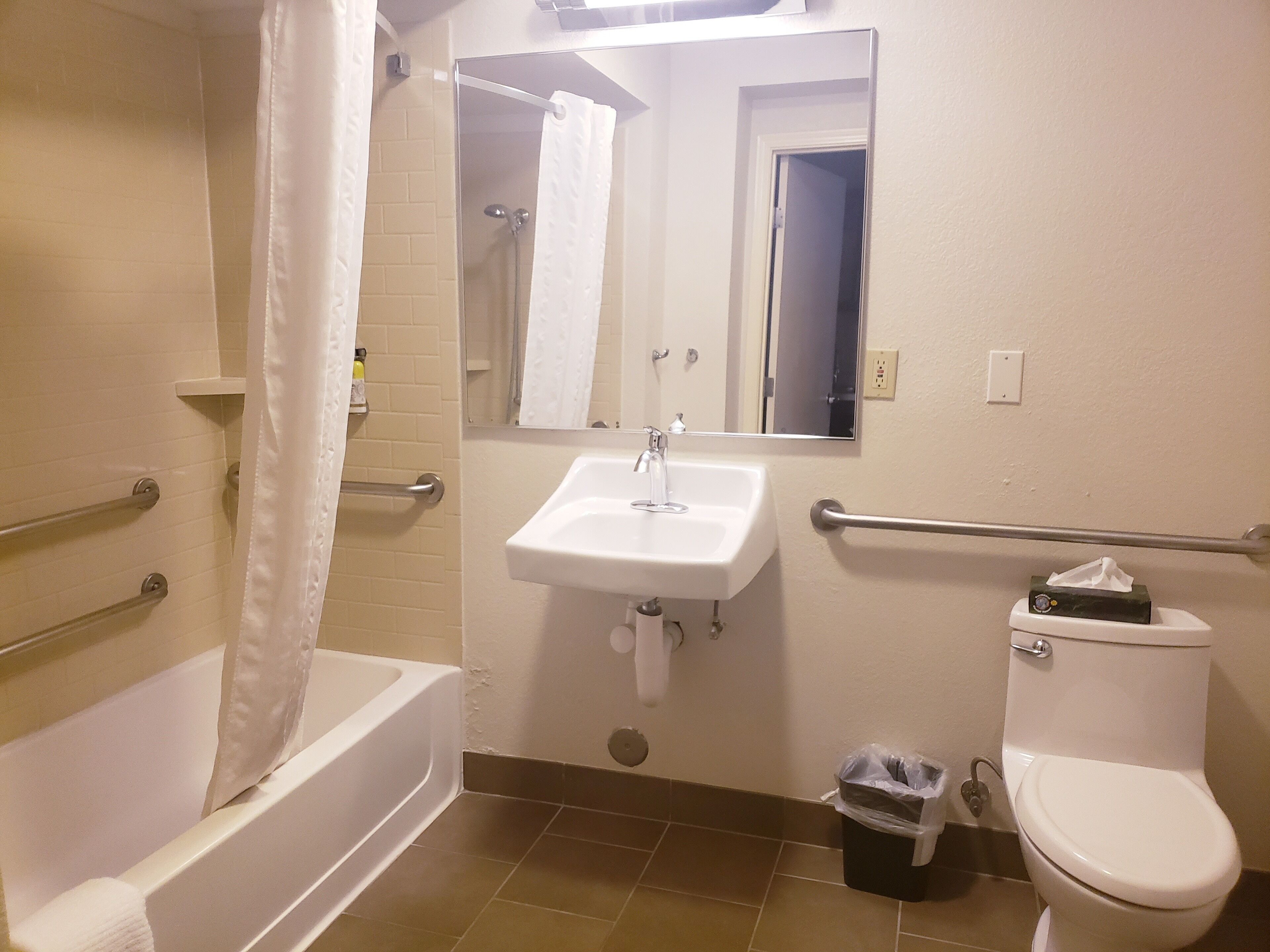 studio suite, 1 queen bed, accessible, bathtub (mobility) | bathroom | combined shower/bathtub, hair dryer, towels, soap