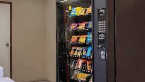 A vending machine stocked with various snacks and beverages. - Red Roof Inn & Suites Oxford (Oxford)