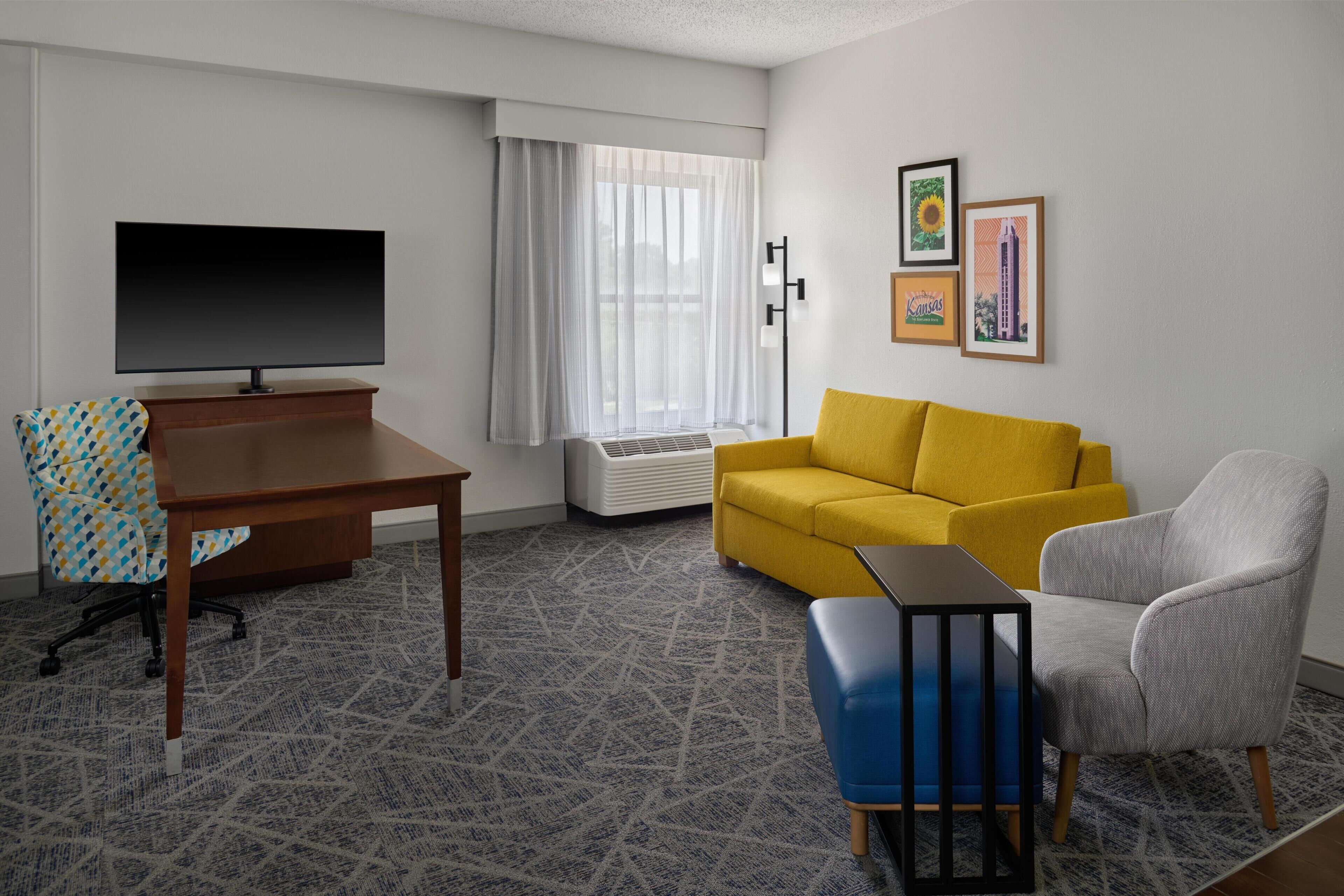 King Studio Suite | Living area | 43-inch LCD TV with satellite channels, TV