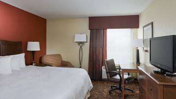 Hypo-allergenic bedding, laptop workspace, blackout curtains