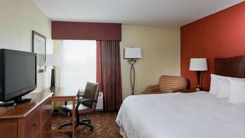 Hypo-allergenic bedding, laptop workspace, blackout curtains