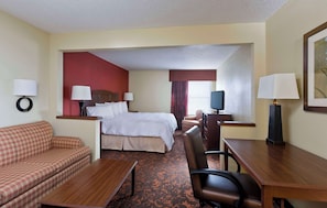 Hypo-allergenic bedding, laptop workspace, blackout drapes