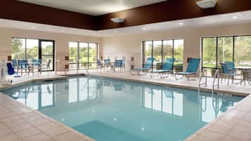 Indoor pool, open 6:00 AM to midnight, pool loungers