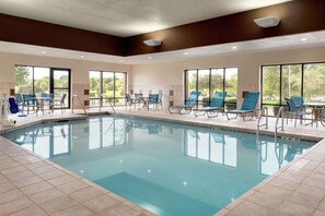 Indoor pool, open 6:00 AM to midnight, pool loungers