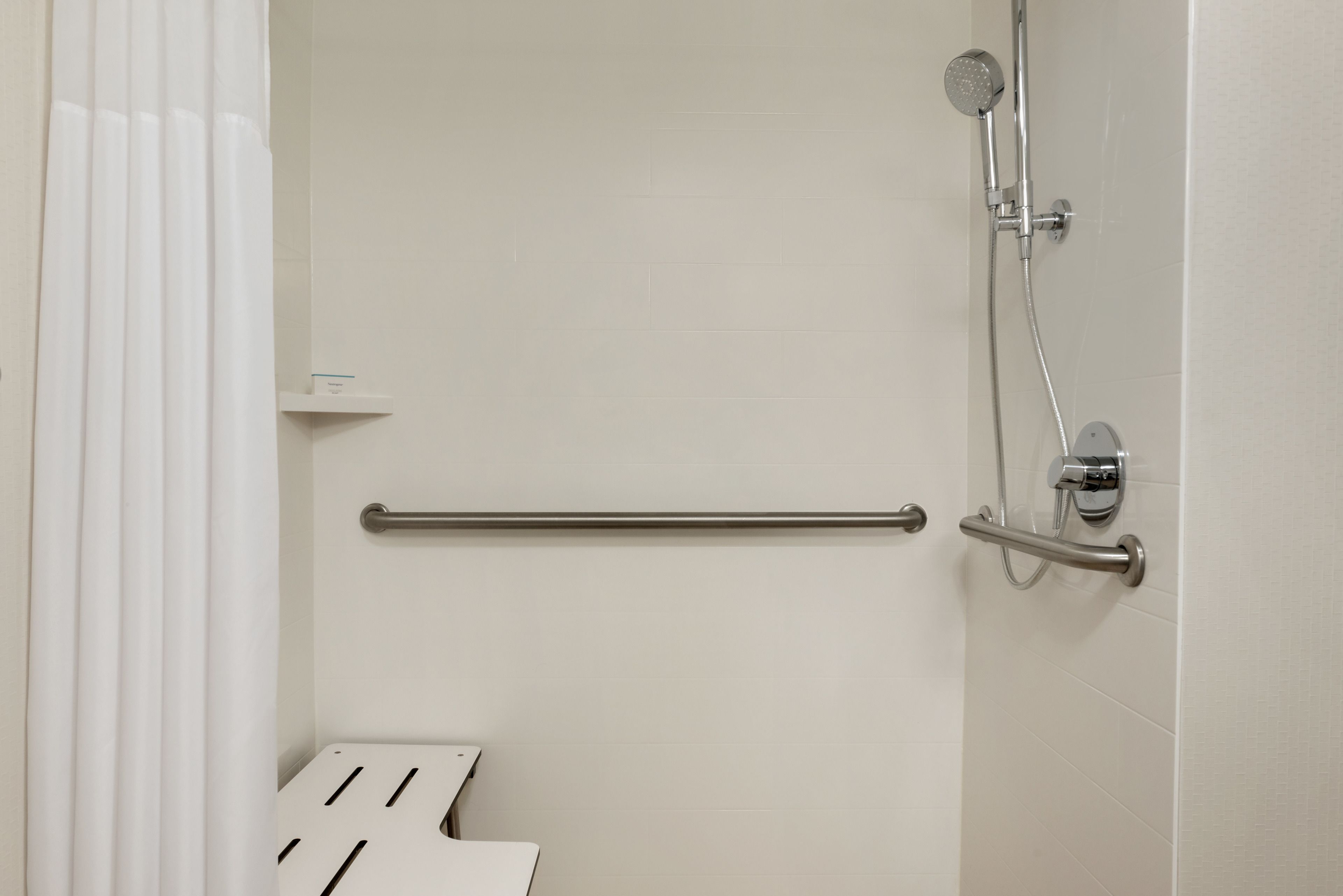 combined shower/bathtub, free toiletries, hair dryer, towels