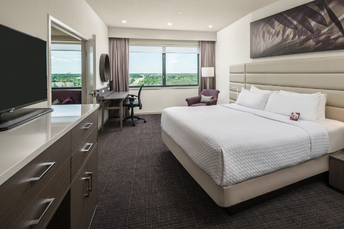 Suite, 1 Bedroom (Living Area & Add'l Half Bath) | Egyptian cotton sheets, premium bedding, pillowtop beds, in-room safe