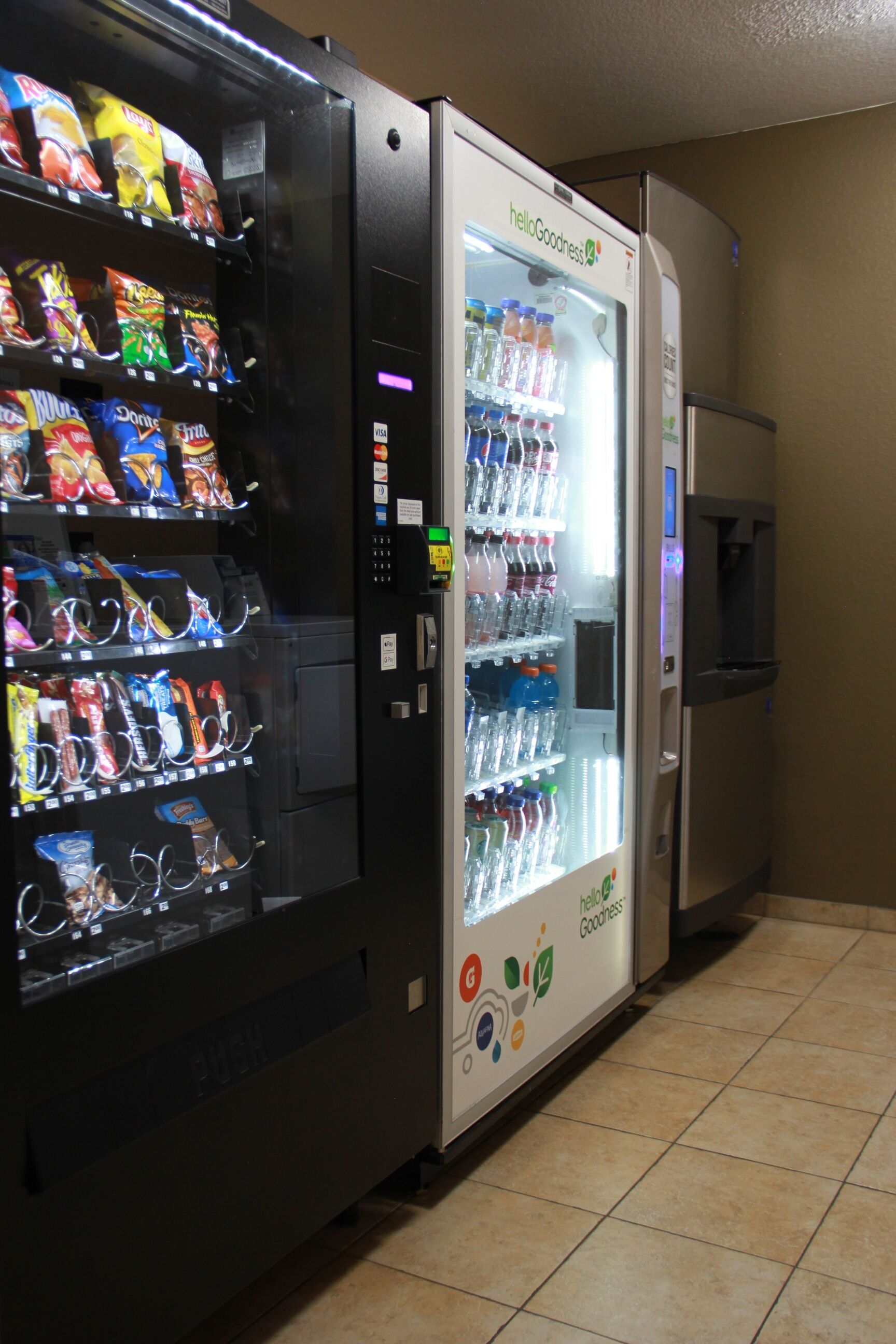 A vending machine with snacks and bottled water.