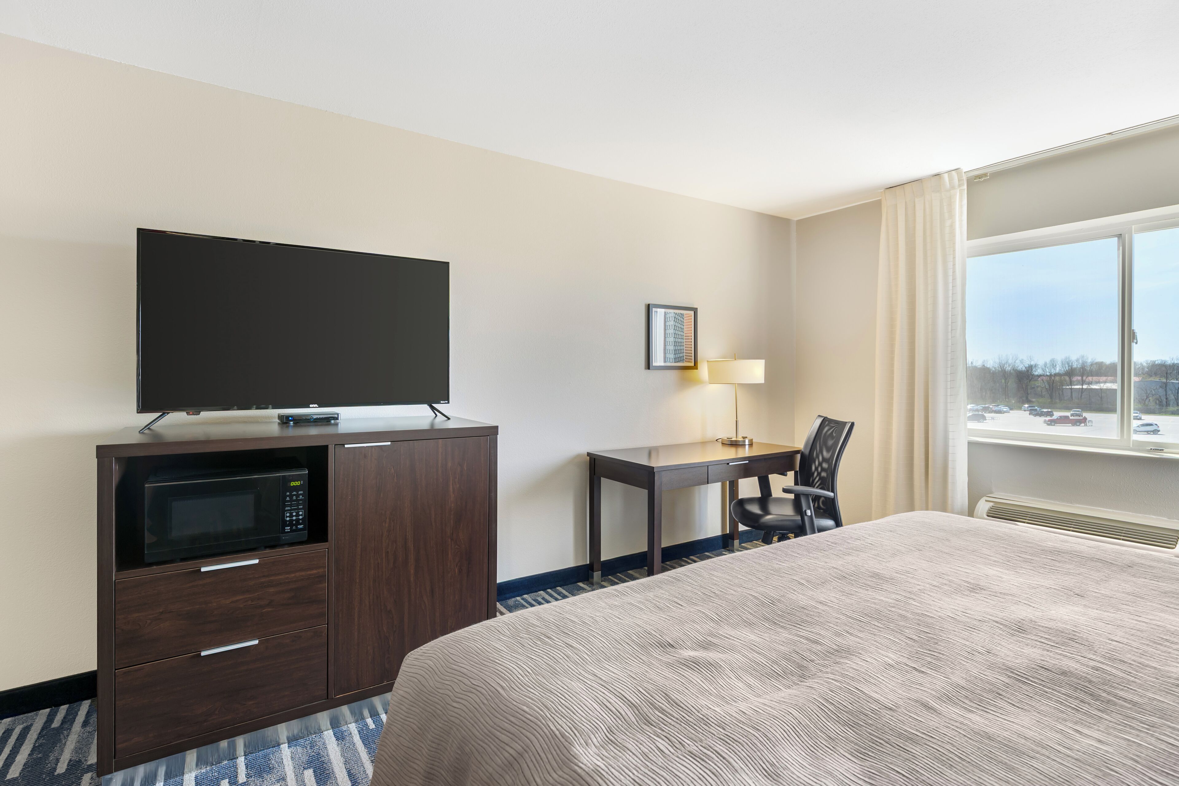 suite, 1 king bed with sofa bed, non smoking | in-room safe, desk, iron/ironing board, free cots/infant beds