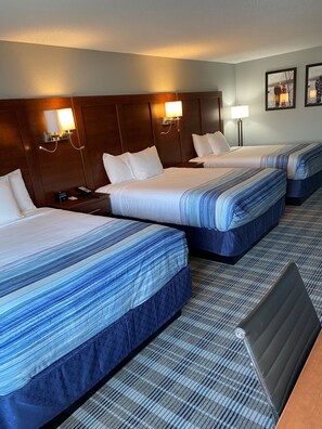 Room, Multiple Beds, Non Smoking | Individually decorated, individually furnished, desk, laptop workspace - AmericInn by Wyndham Williamsburg (South Amana)