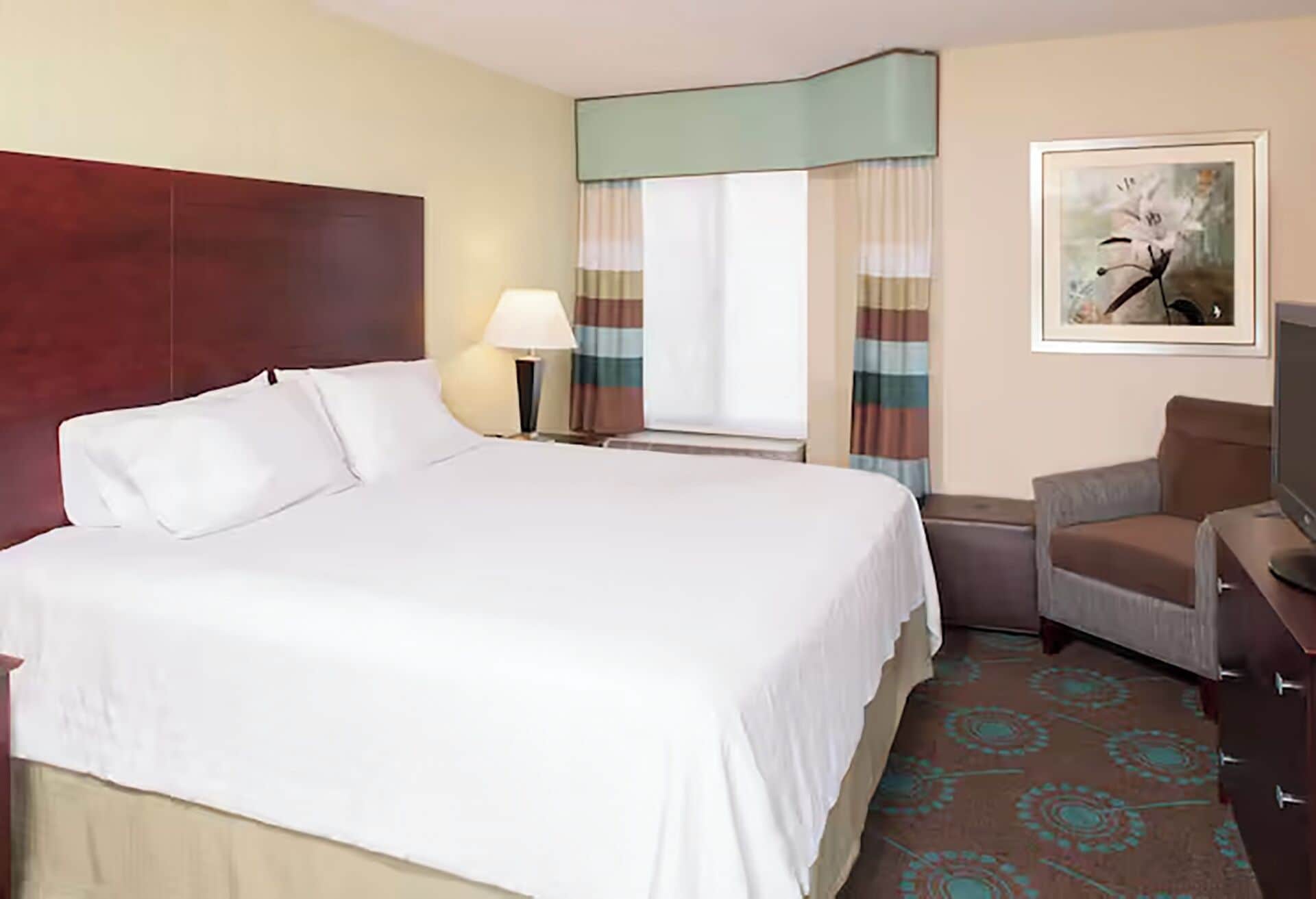 Premium bedding, pillowtop beds, desk, laptop workspace