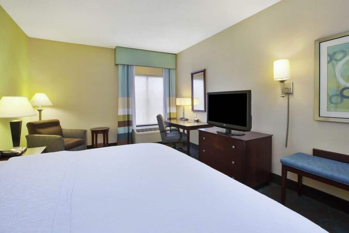 Premium bedding, pillow-top beds, desk, laptop workspace