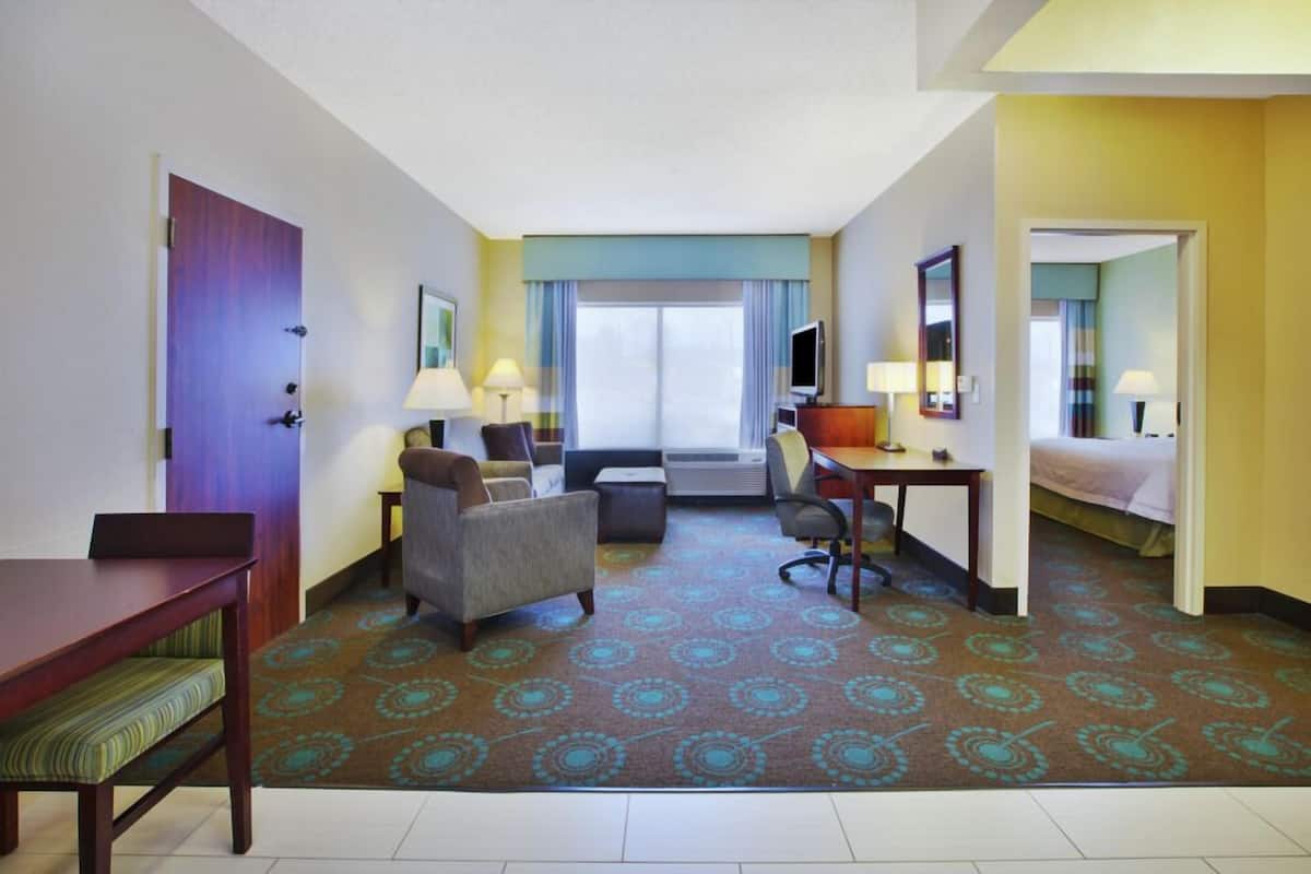 Premium bedding, pillow-top beds, desk, laptop workspace