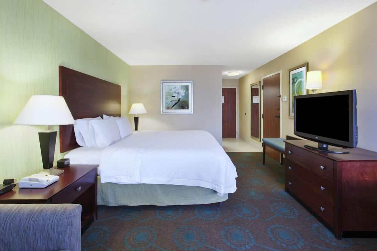 Premium bedding, pillow-top beds, desk, laptop workspace