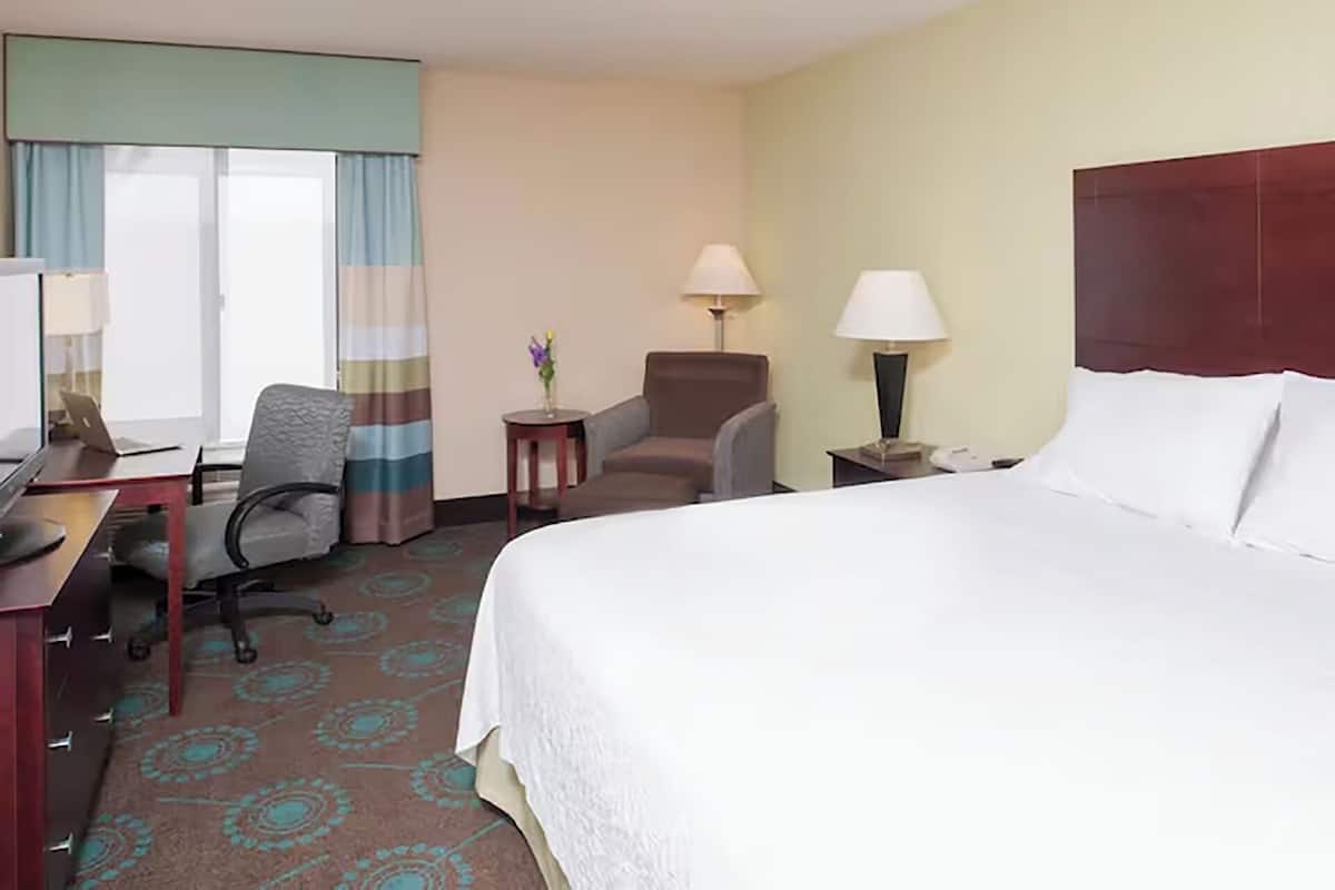 Premium bedding, pillow-top beds, desk, laptop workspace