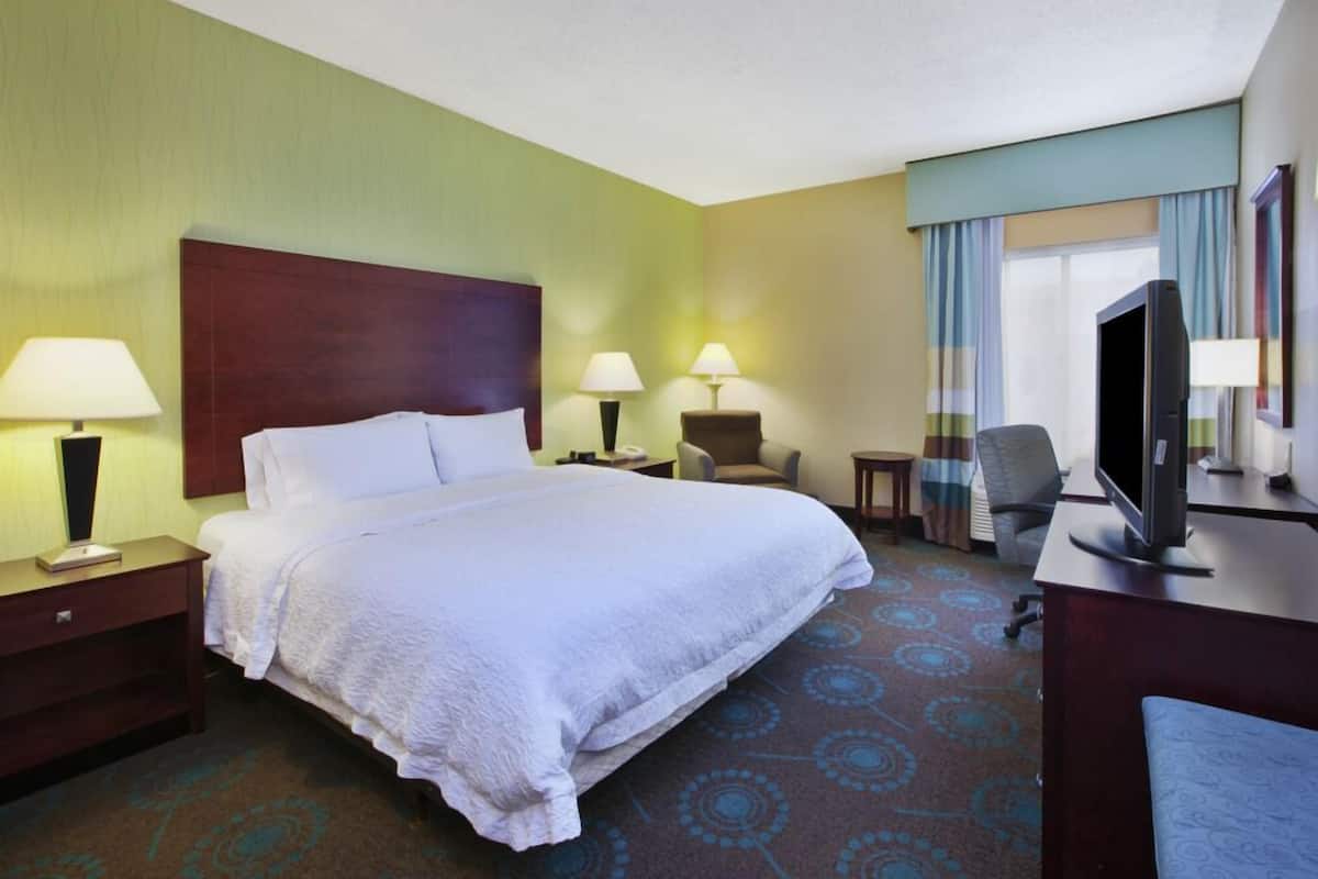 Premium bedding, pillow-top beds, desk, laptop workspace