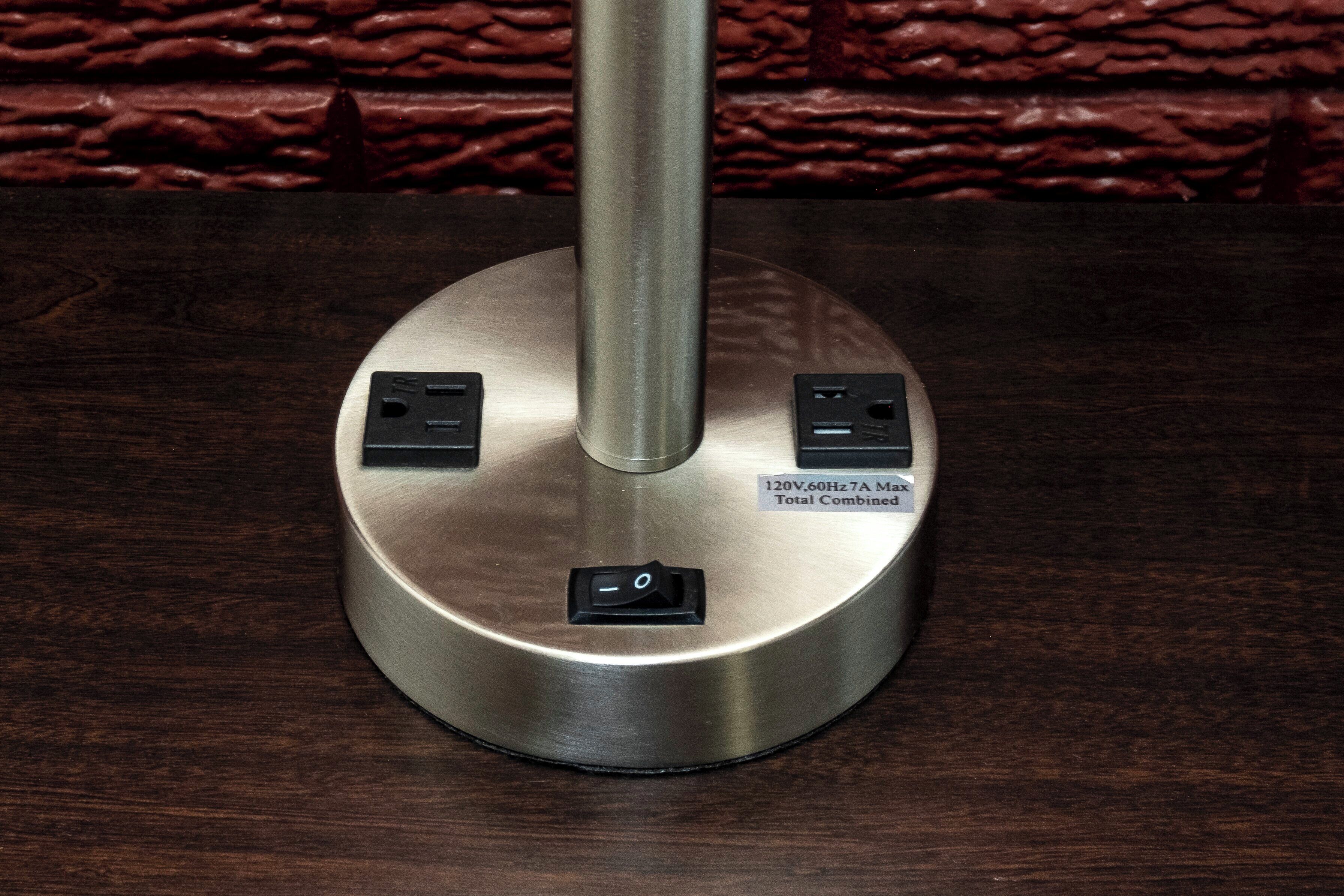A metallic base with two power outlets and a switch, labeled '120V, 60Hz 7A MAX Total Combined'.
