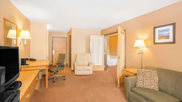 Suite, 1 King Bed, Refrigerator | In-room safe, desk, iron/ironing board, free cots/infant beds