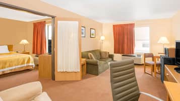 Suite, 1 King Bed, Refrigerator | In-room safe, desk, iron/ironing board, free cots/infant beds