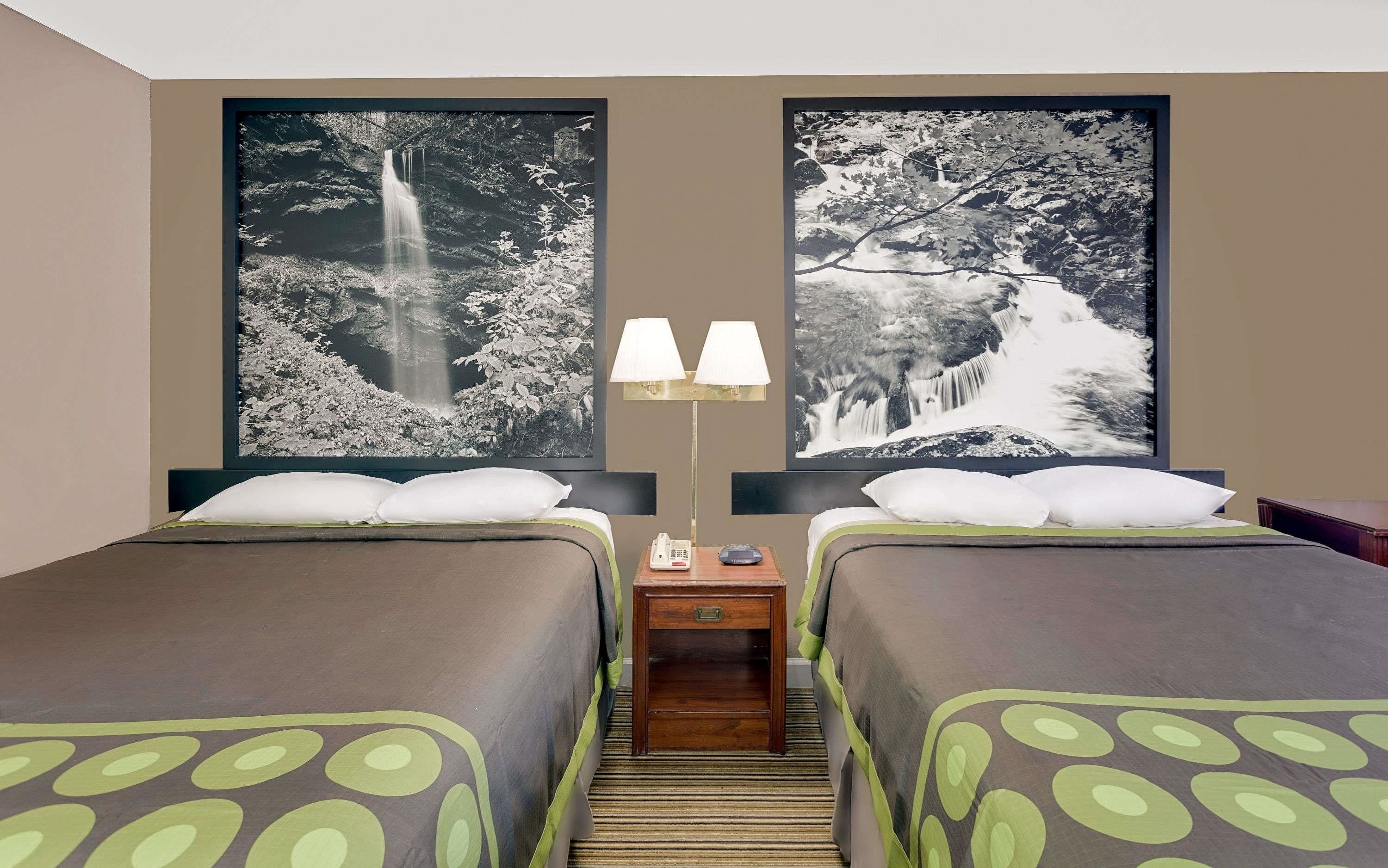 Desk, blackout drapes, iron/ironing board, rollaway beds