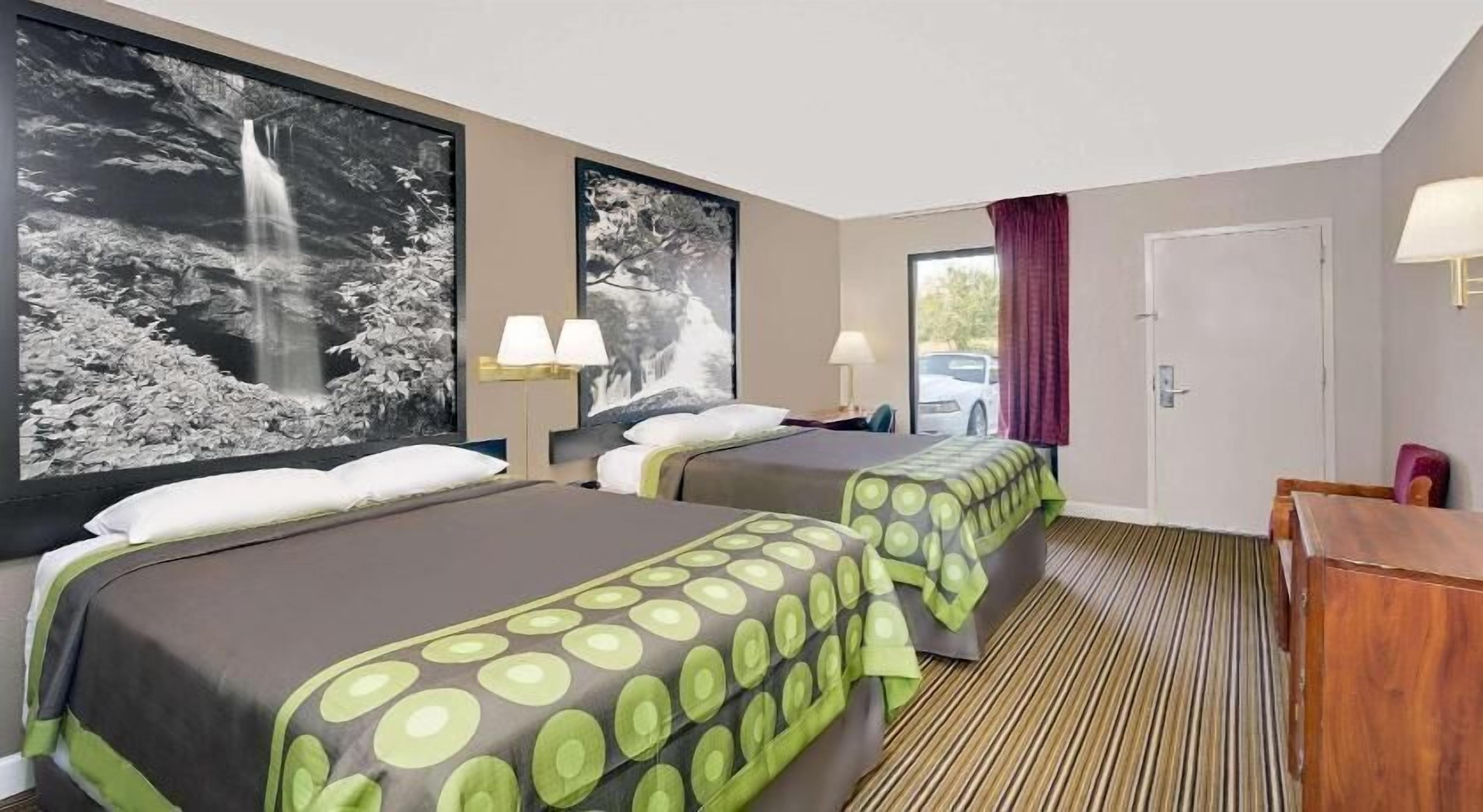Desk, blackout curtains, iron/ironing board, rollaway beds