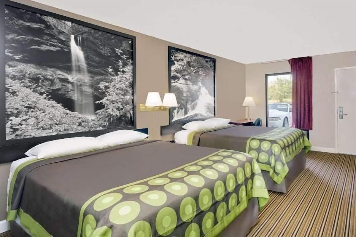 Desk, blackout curtains, iron/ironing board, rollaway beds