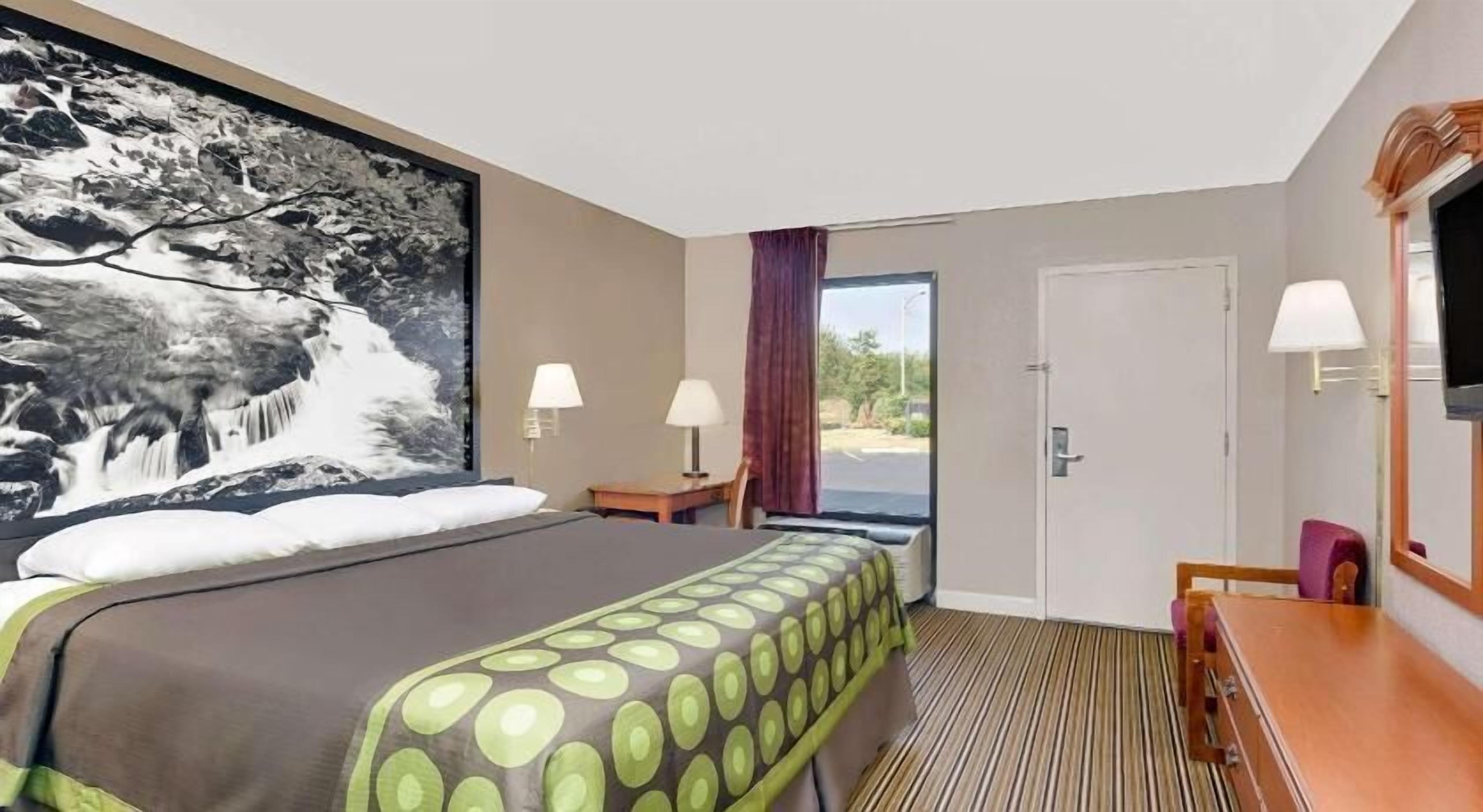 Desk, blackout curtains, iron/ironing board, rollaway beds