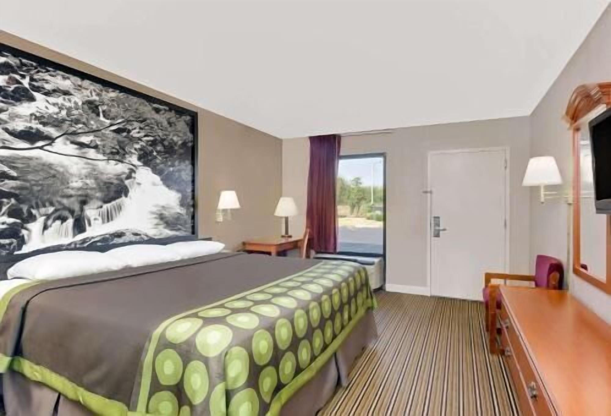 Desk, blackout curtains, iron/ironing board, rollaway beds