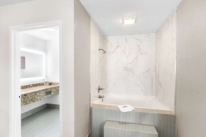 Suite, 1 King Bed, Non Smoking | Iron/ironing board, free WiFi, bed sheets, alarm clocks