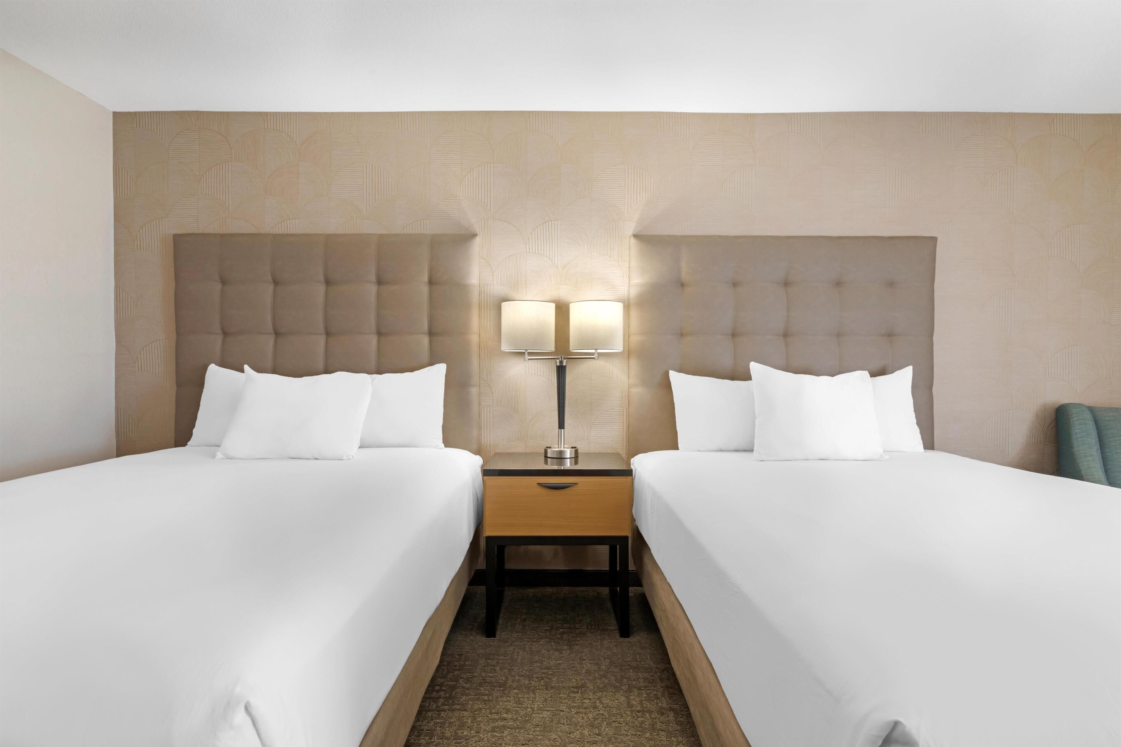 Desk, laptop workspace, blackout drapes, iron/ironing board