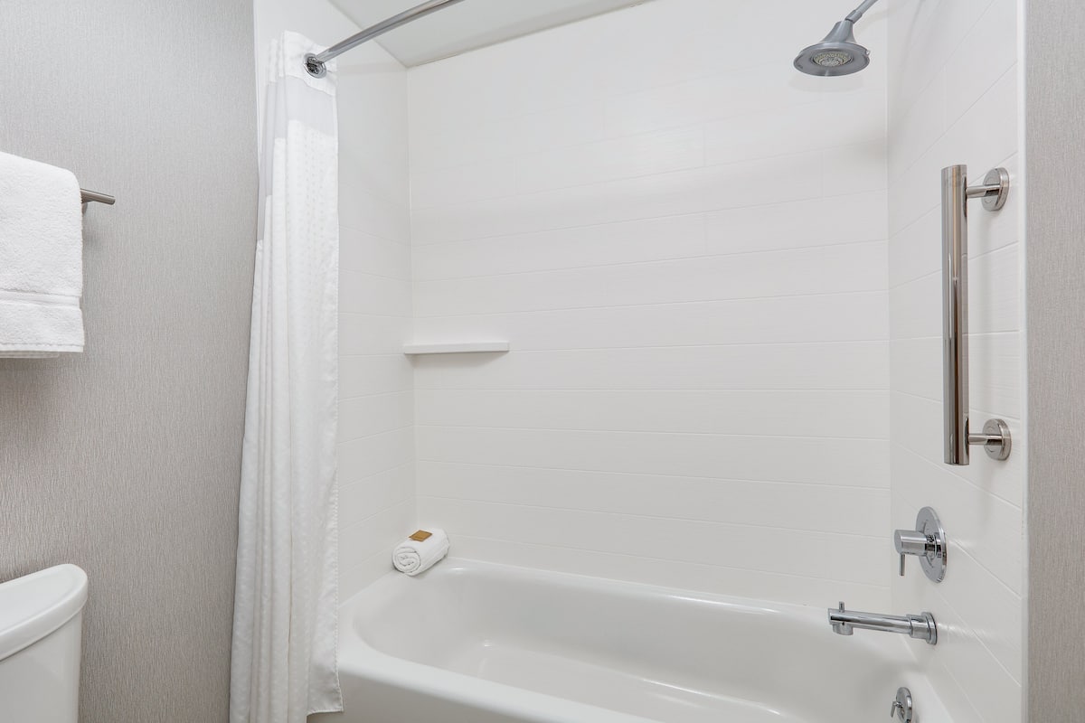 Standard Room, 2 Queen Beds | Bathroom | Combined shower/tub, hair dryer, towels