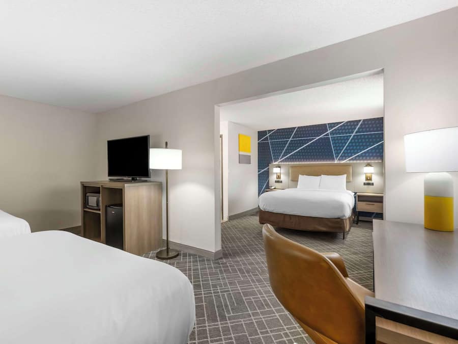 Premium bedding, desk, blackout drapes, iron/ironing board