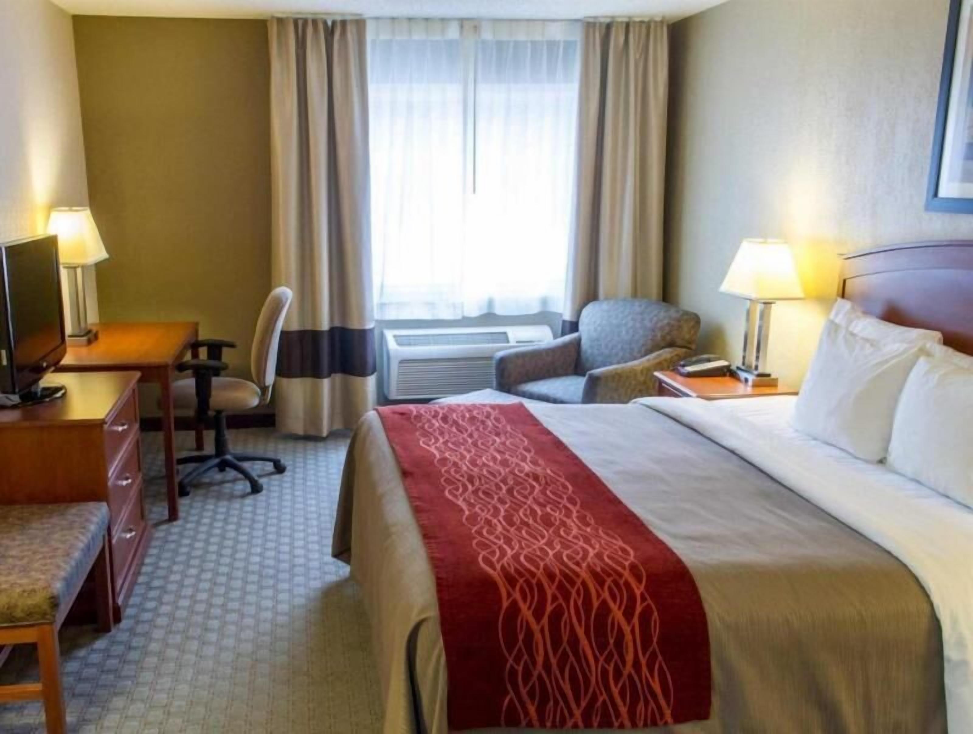 Premium bedding, desk, blackout curtains, iron/ironing board