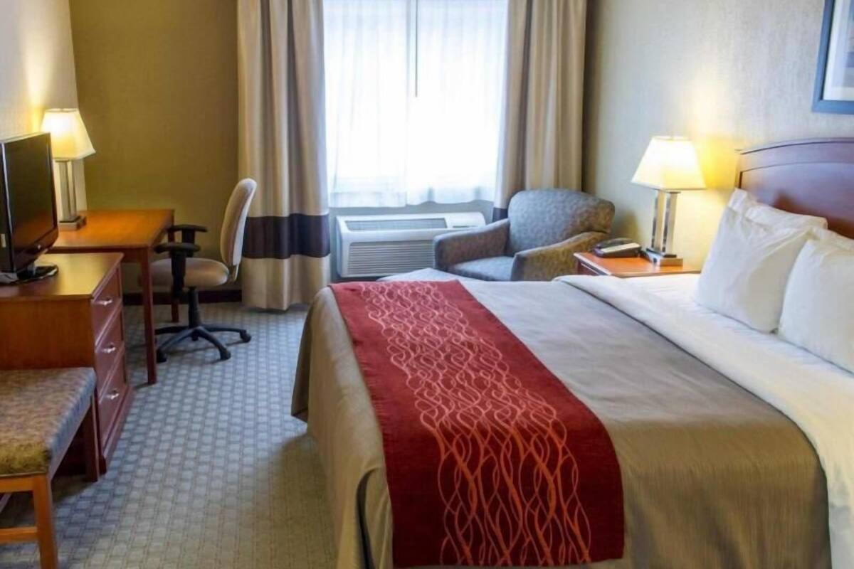 Premium bedding, desk, blackout drapes, iron/ironing board