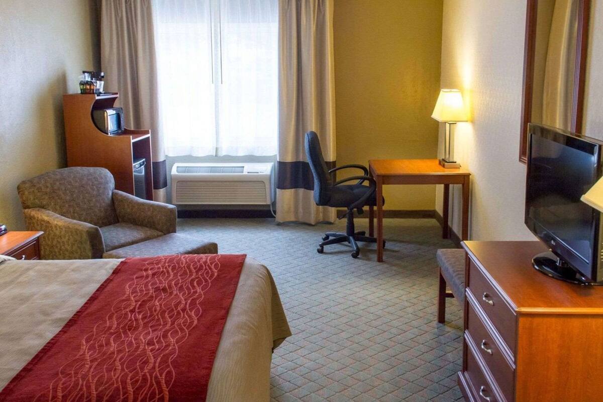 Premium bedding, desk, blackout drapes, iron/ironing board